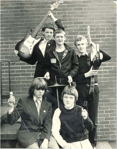 The Fretz circa 1979 - clockwise from top left: Mark Mortimer (bass), Phil Hobbins (drums), Donald Skinner (guitar), Derek Goodwin (dancer, keyboards), Matthew Lees (vocals, guitar).