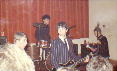 Private Property live at Wigginton Village Hall in June 1982 showing (L-R) Tim Goode, Andrew Baines, Brian Lacey and Mark Mortimer.