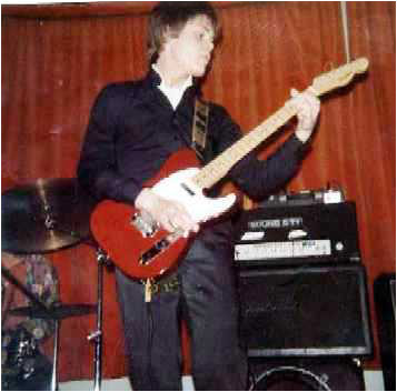 Andrew Baines of Thirty Frames A Second on stage at Wigginton Village Hall sometime in 1981.